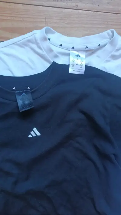 Pack de 2 poleras Adidas Talla M y L - miniatura 1