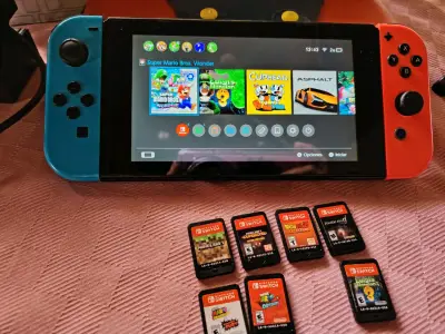 Nintendo Switch con juegos y accesorios - miniatura 1