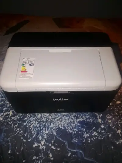 Impresora láser Brother HL-1200 compacta - miniatura 1