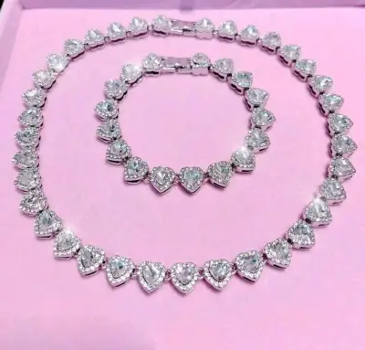 Conjunto de collar y pulsera con corazones brillantes - miniatura 1