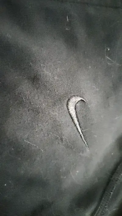 Chaqueta deportiva negra Nike para hombre o mujer - miniatura 2