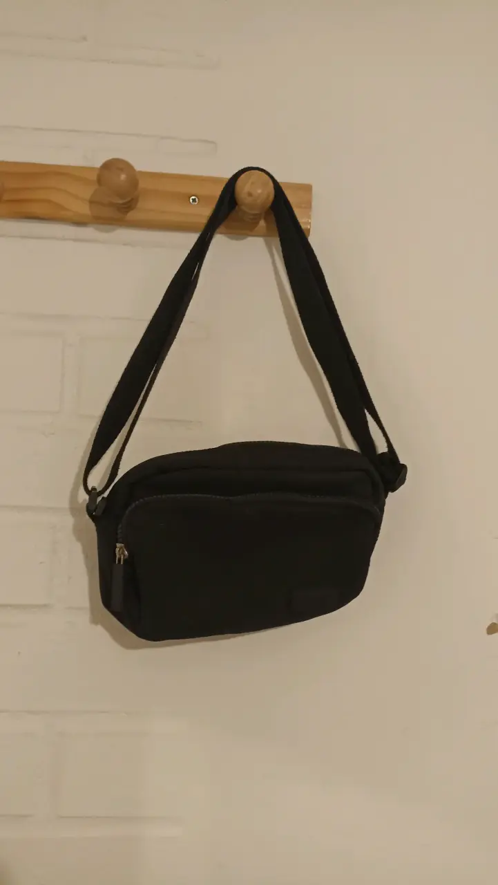 Banano negro unisex con cierre