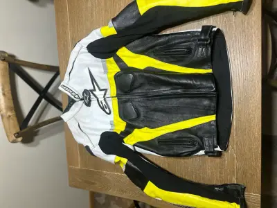 Chaqueta de moto Alpinestars negra y amarilla - miniatura 1