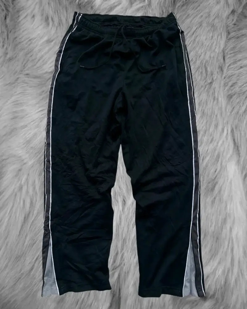 Trackpants deportivos negros con franjas laterales - 1