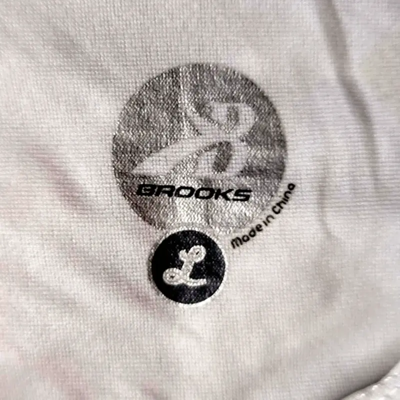 Top Deportivo Brooks Talla L - 4