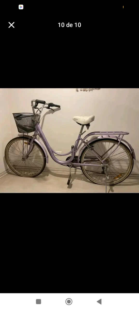Bicicleta urbana morada con canasto - 1