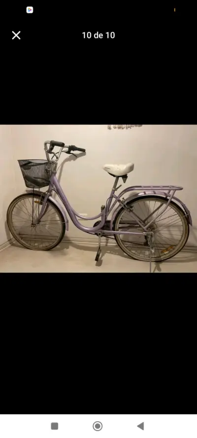 Bicicleta urbana morada con canasto - miniatura 1