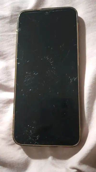 Teléfono Motorola con pantalla dañada - miniatura 2