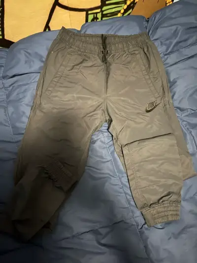 Pantalones deportivos Nike para hombre en color gris - miniatura 1