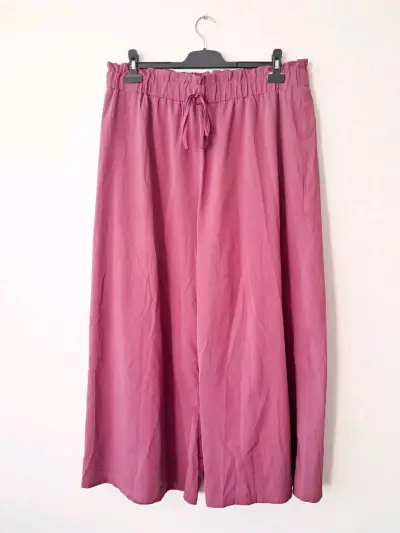 Pantalones palazzo rosados para mujer - miniatura 1