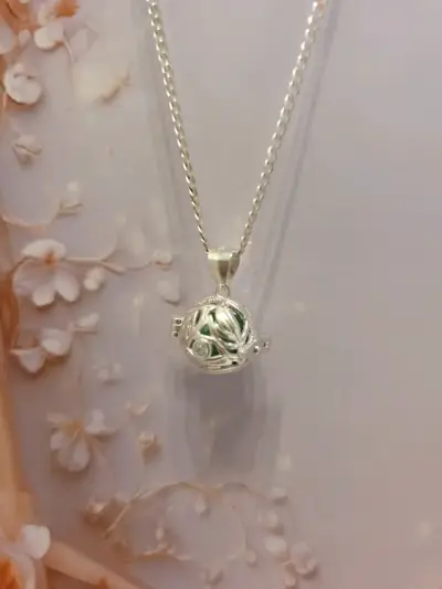 Collar de plata con dije esférico decorativo - miniatura 1