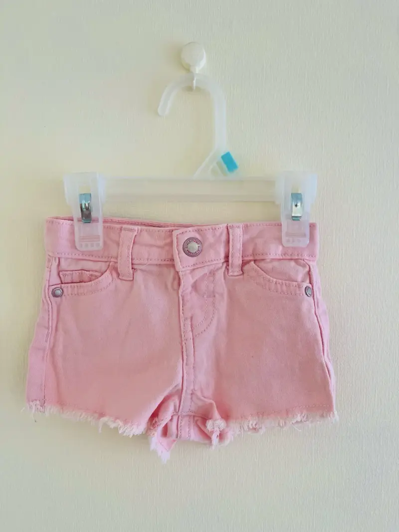 Conjunto de polera y shorts rosados para niña 6m - 4