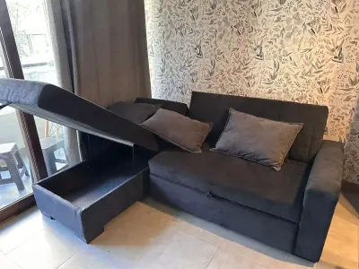 Sofá cama negro con almacenamiento - miniatura 1