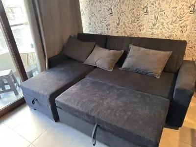 Sofá cama negro con almacenamiento - miniatura 2