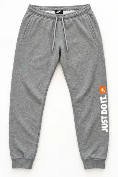 Pantalones deportivos grises Nike Just Do It - miniatura 1