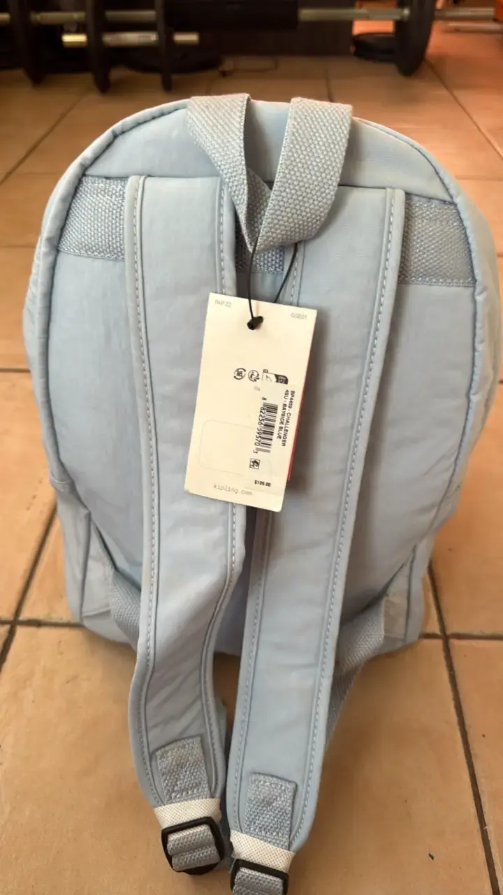 Mochila Kipling azul claro con llavero de mono - 2