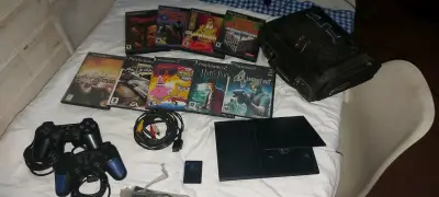 Consola PlayStation 2 con juegos y accesorios - miniatura 5