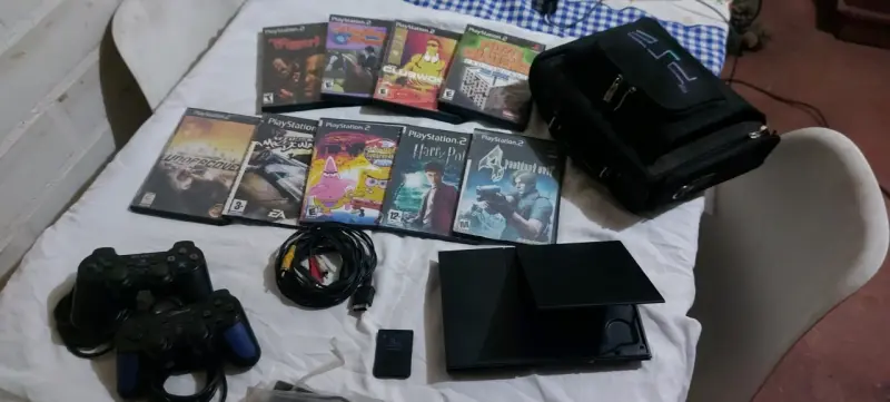Consola PlayStation 2 con juegos y accesorios - 6