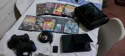Consola PlayStation 2 con juegos y accesorios - miniatura 6