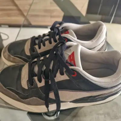 Zapatillas deportivas Puma negras y grises - miniatura 1