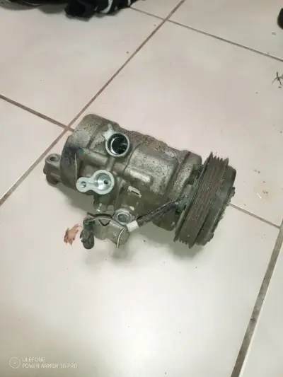 Compresor de aire acondicionado para auto usado - miniatura 1