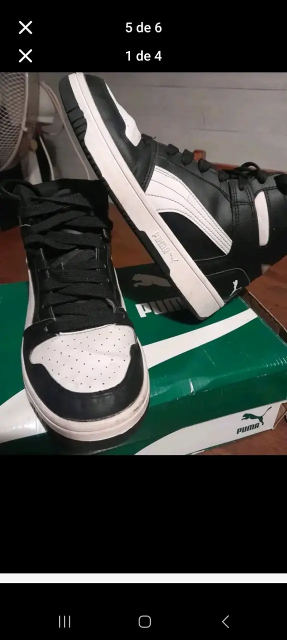 Zapatillas deportivas negras y blancas Puma - 1