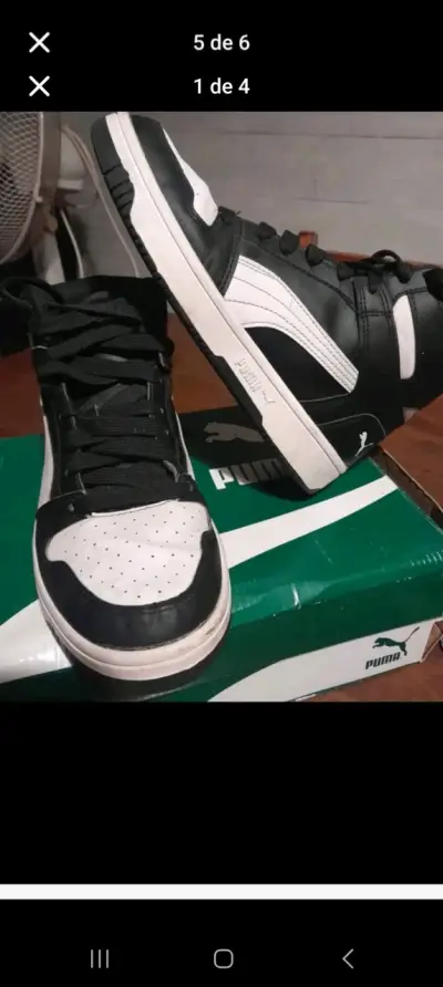 Zapatillas deportivas negras y blancas Puma - miniatura 1