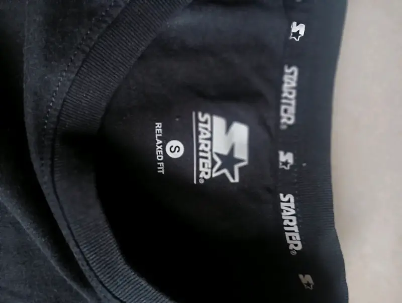 Polera negra Starter con bolsillo - 3