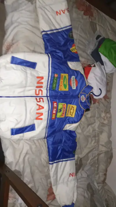 Chaqueta de carreras Nissan azul y blanca - miniatura 1