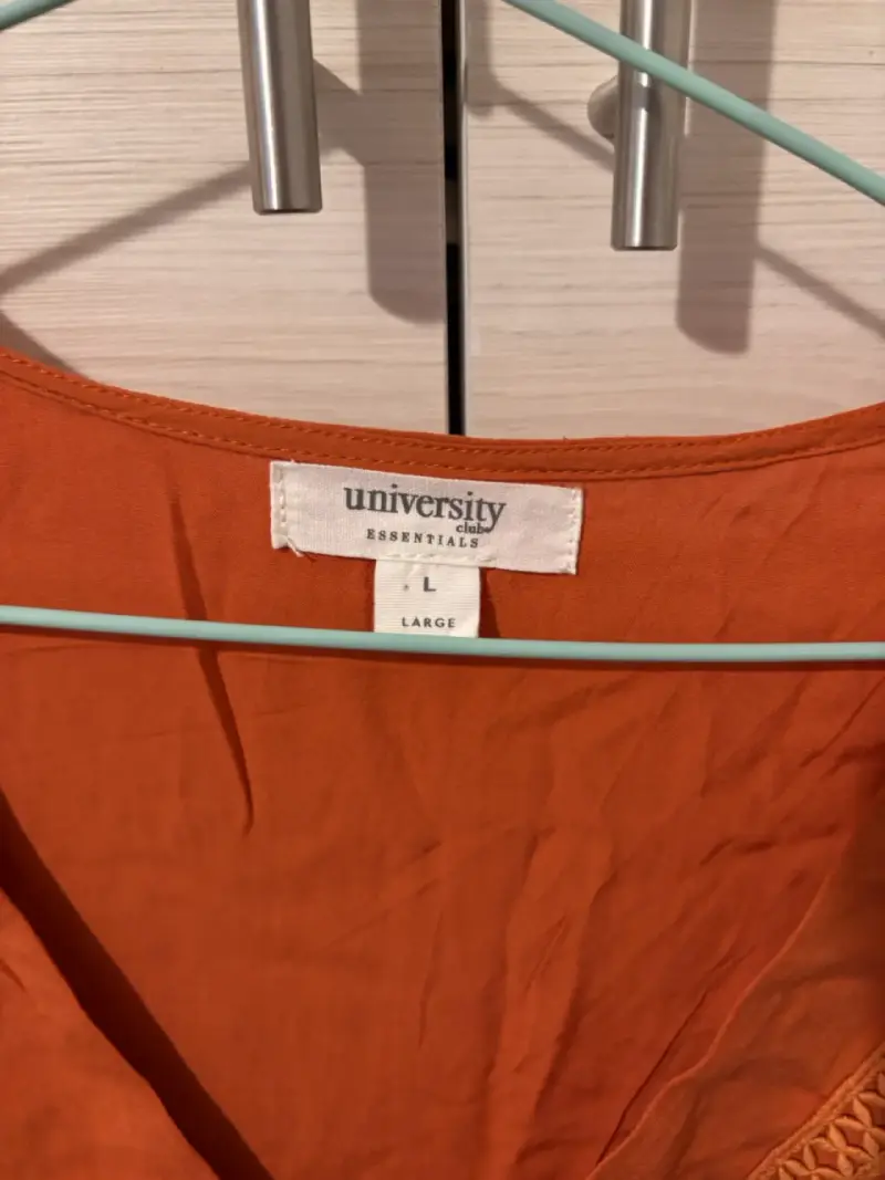 Blusa naranja University Club - 2