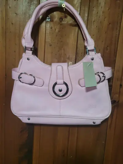 Bolso de mano rosado con detalles metálicos - miniatura 1