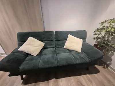 Sofá cama verde oscuro con cojines - miniatura 1