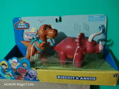Juguetes Dino Ranch Biscuit y Angus interactivos - miniatura 1