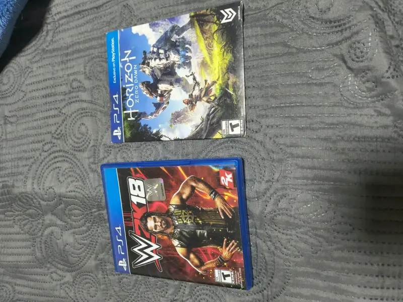 Juegos PS4 WWE 2K18 y horizon.