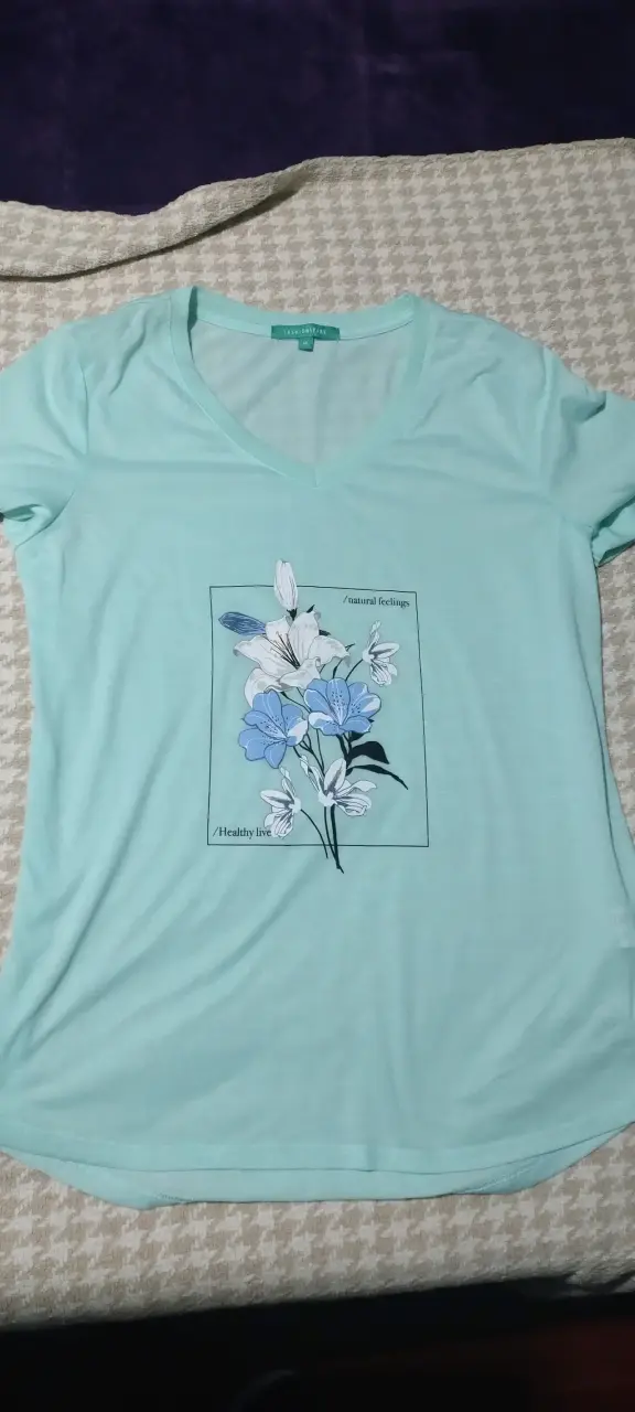 Polera celeste con estampado floral Fashion Park