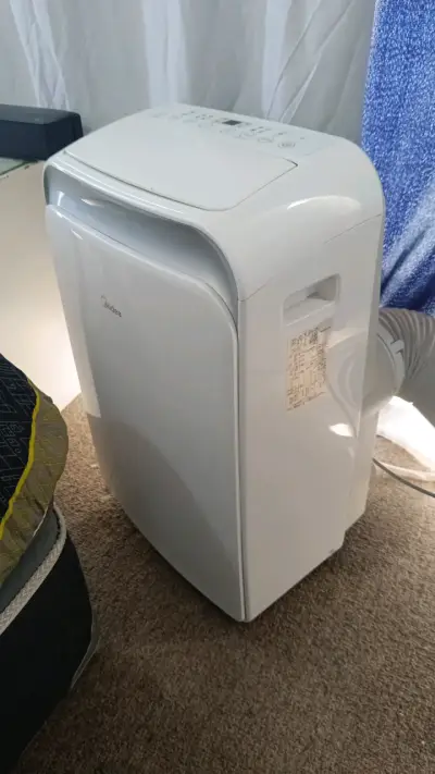 Aire acondicionado portátil Midea 12,000 BTU - miniatura 2