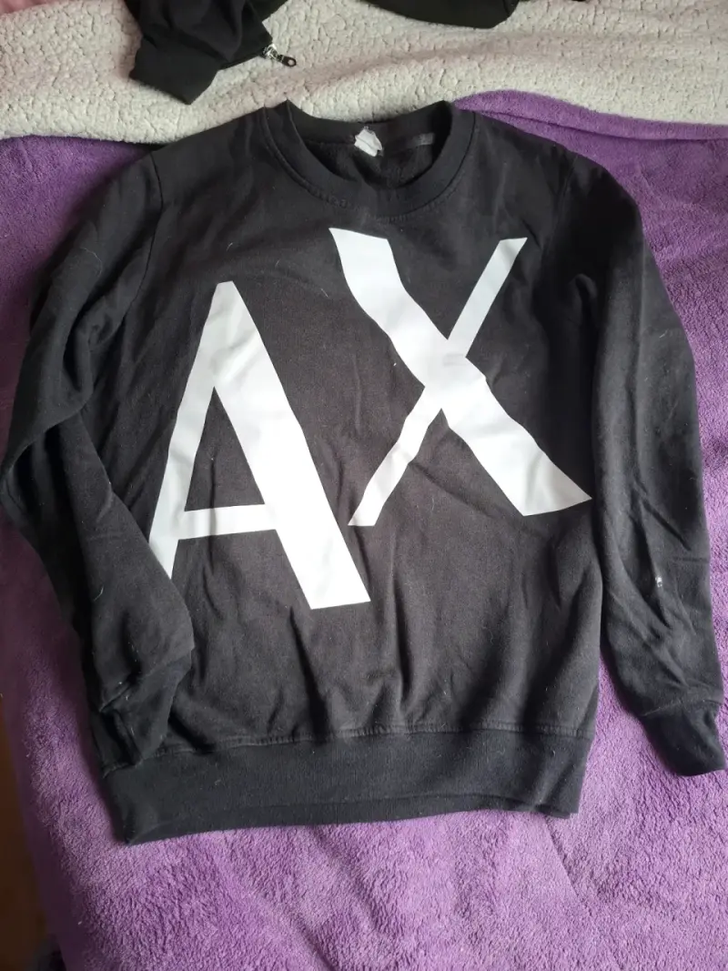 Polerón negro con logo AX para hombre