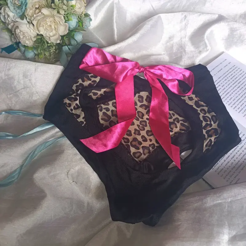 Panty de encaje con estampado animal y lazo rosa - 2