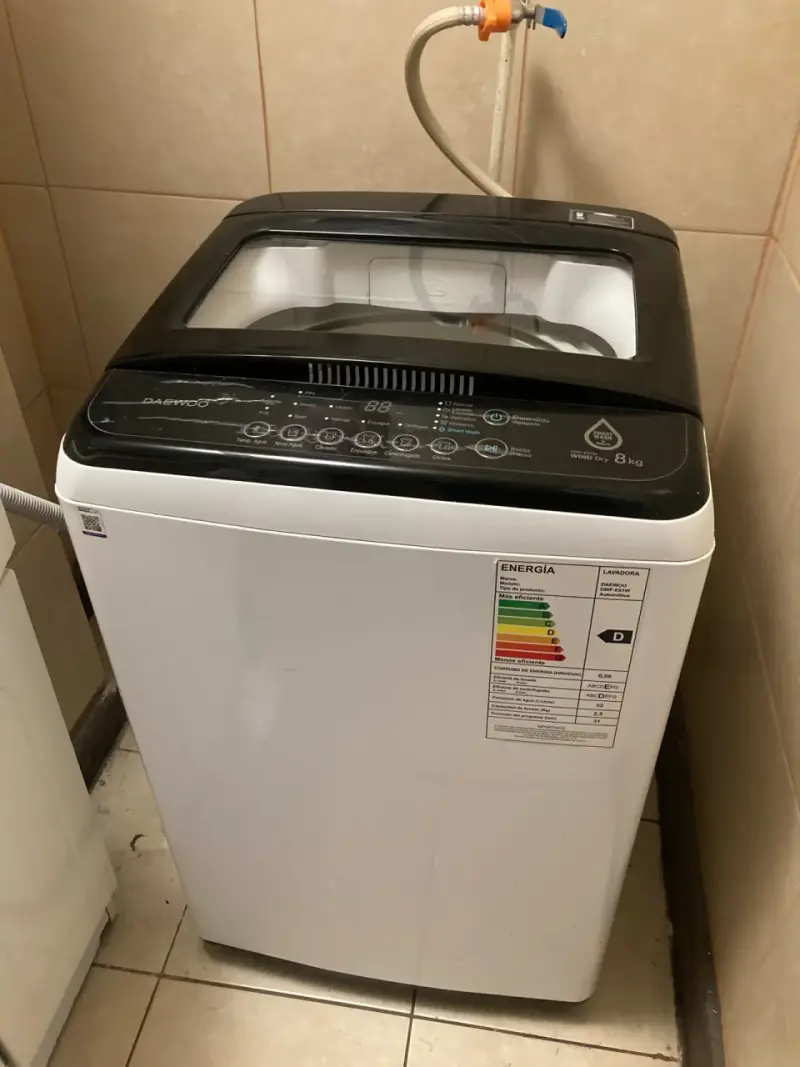Lavadora Daewoo 8kg con Secado Wind Dry - 1