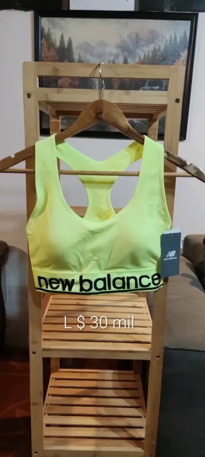Polera deportiva New Balance amarilla - miniatura 1