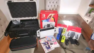Nintendo Switch OLED con accesorios y juegos - miniatura 1