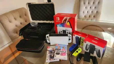 Nintendo Switch OLED con accesorios y juegos - miniatura 2