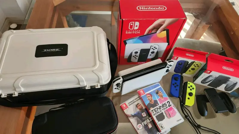 Nintendo Switch OLED con accesorios y juegos - 4
