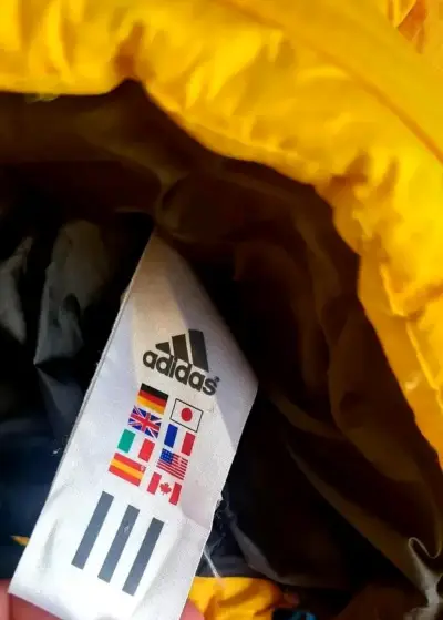 Chaqueta de invierno amarilla y negra Adidas - miniatura 3