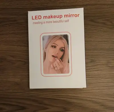 Espejo de maquillaje LED portátil con luz ajustable - miniatura 1