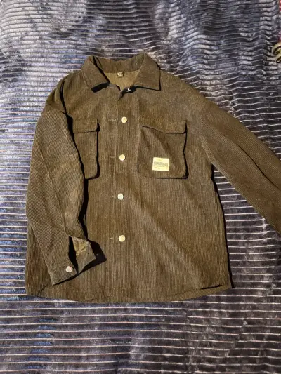 Chaqueta de pana negra con bolsillos - miniatura 1