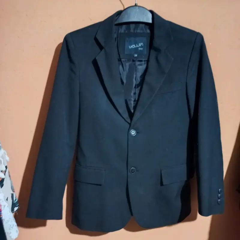 Blazer negro para niño marca House