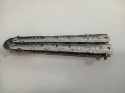 Cuchillo mariposa de entrenamiento metálico - miniatura 1