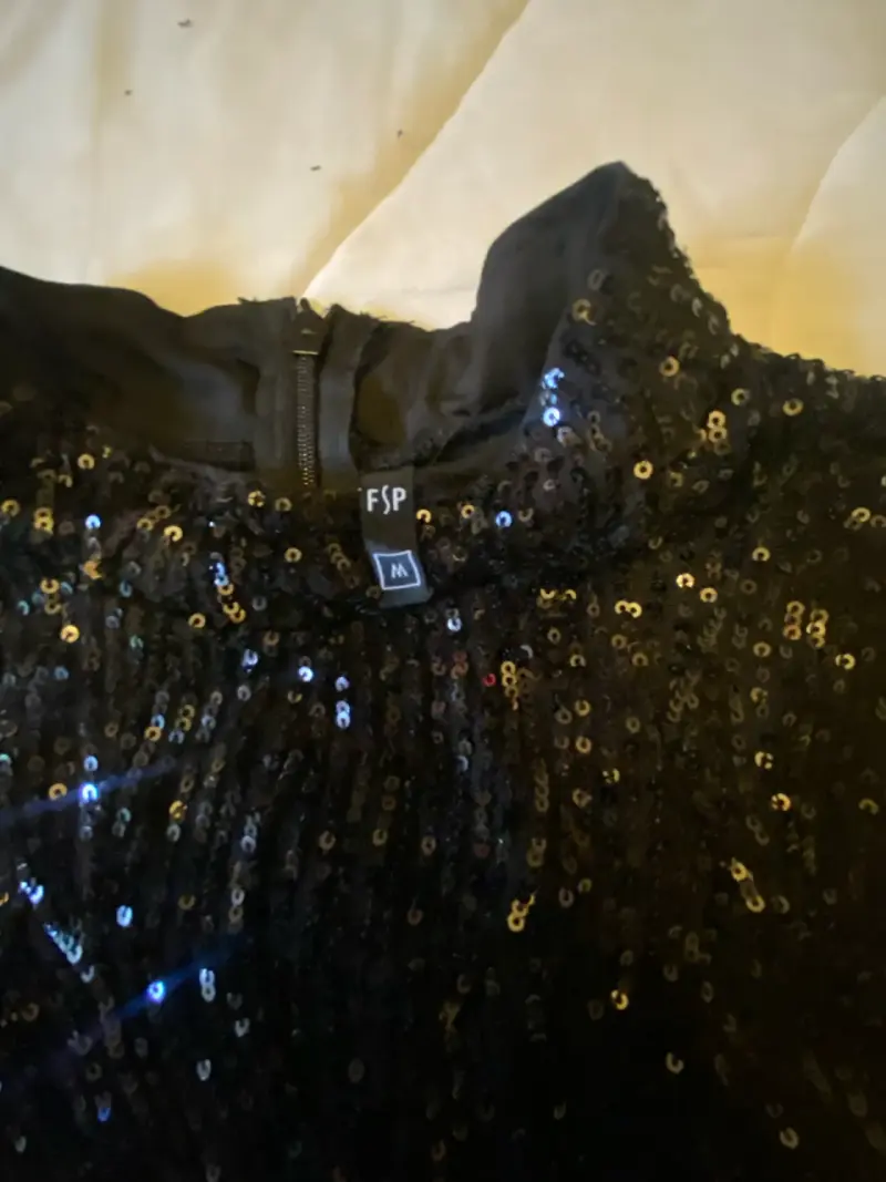 Blusa sin mangas con lentejuelas negras - 2