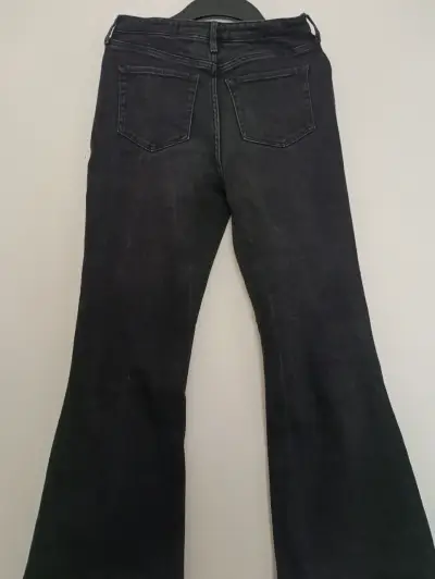 Jeans negros h&m flare talla 12 con roturas - miniatura 2